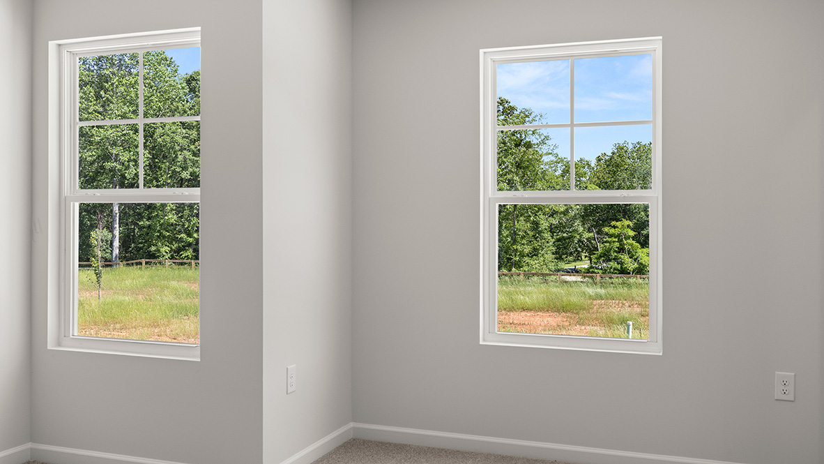 Interior bedroom with windows