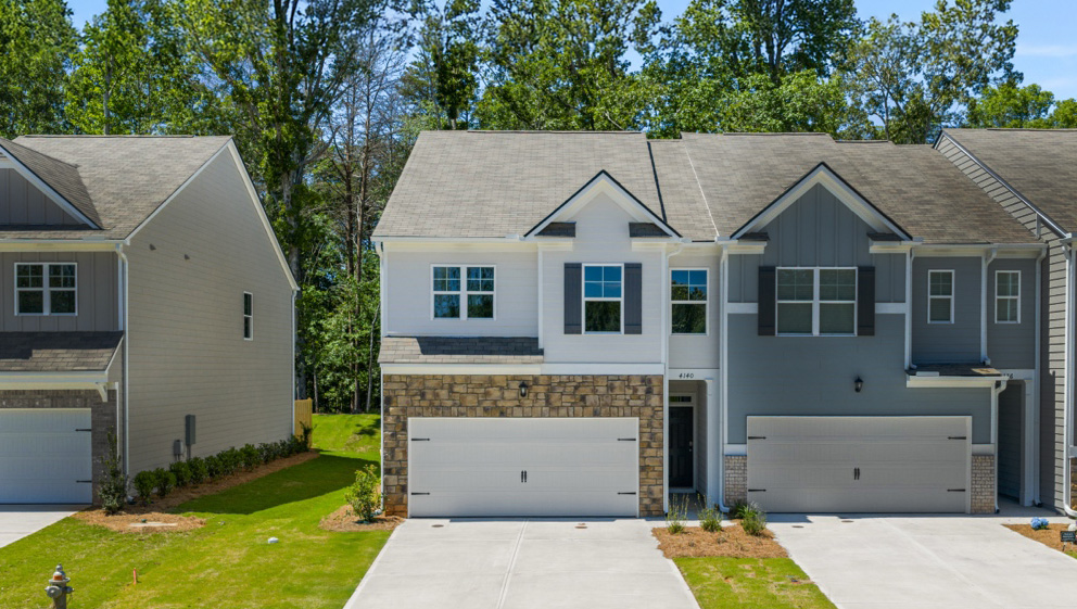 Front exterior of the Sudbury floorplan at Falcon Landing Townhomes in Gainesville, GA