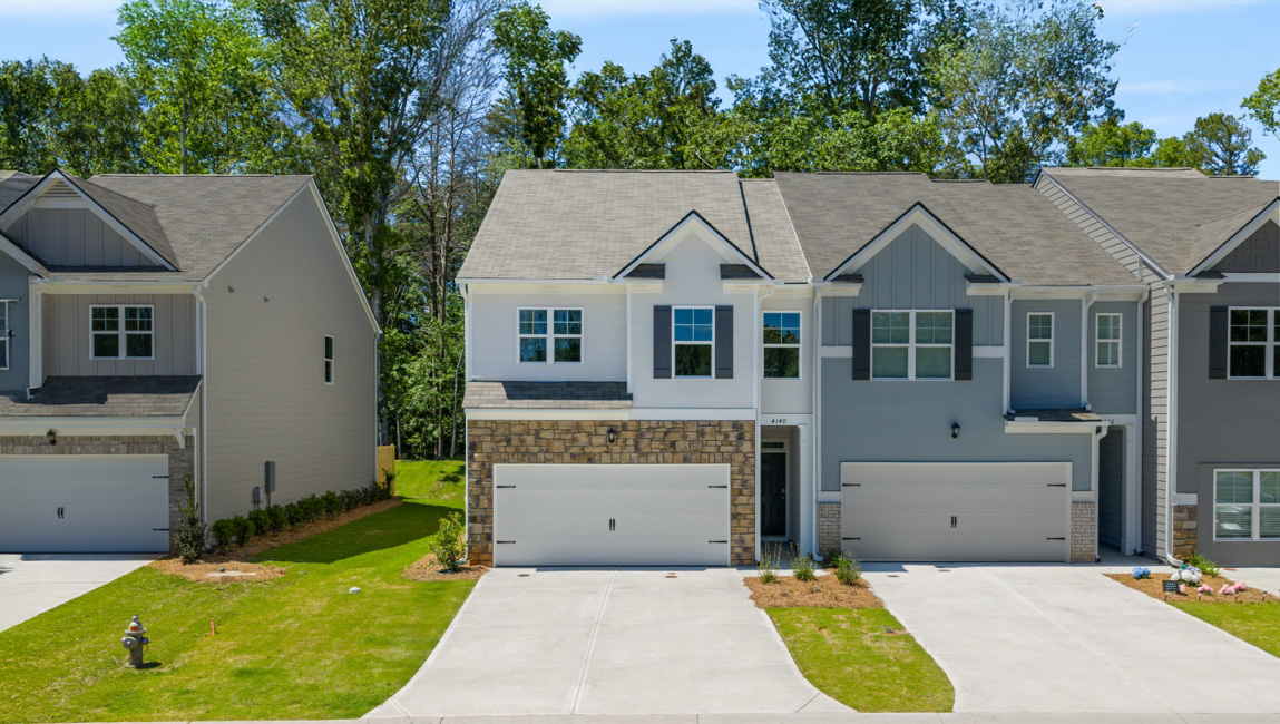Front exterior of the Sudbury floorplan at Falcon Landing Townhomes in Gainesville, GA