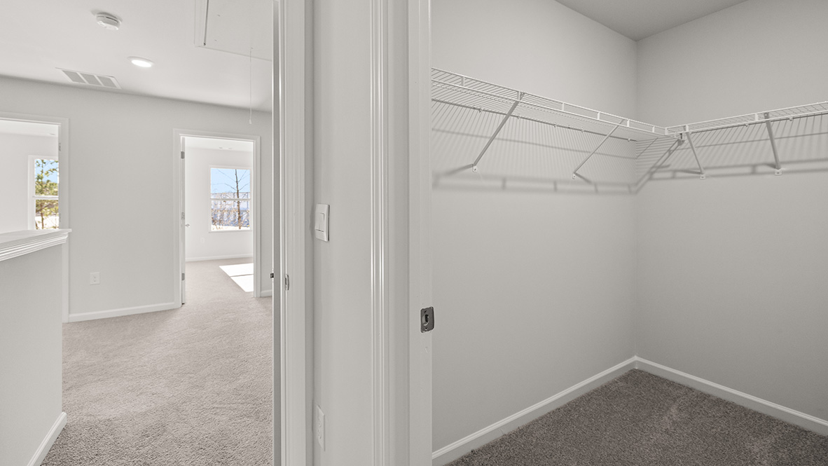 Interior primary walk-in closet