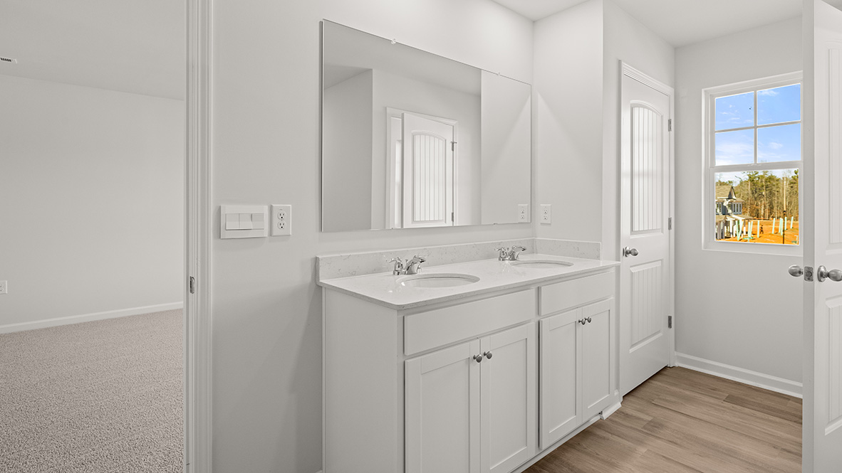 Interior primary bathroom with double sink