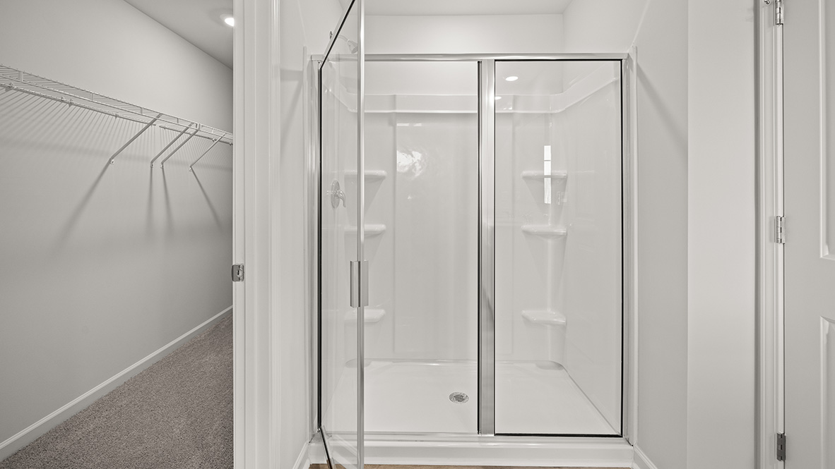 Interior primary bathroom with shower