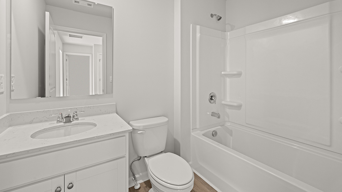 Interior bathroom with sink and full-sized shower