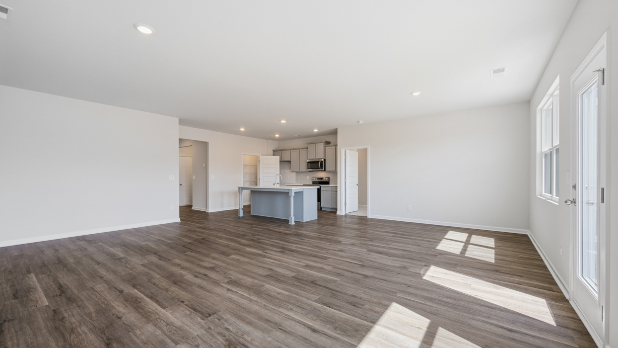 family and dining room to kitchen