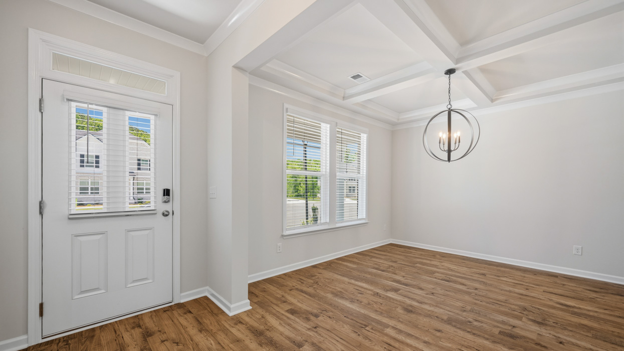 foyer and flex room with natural light