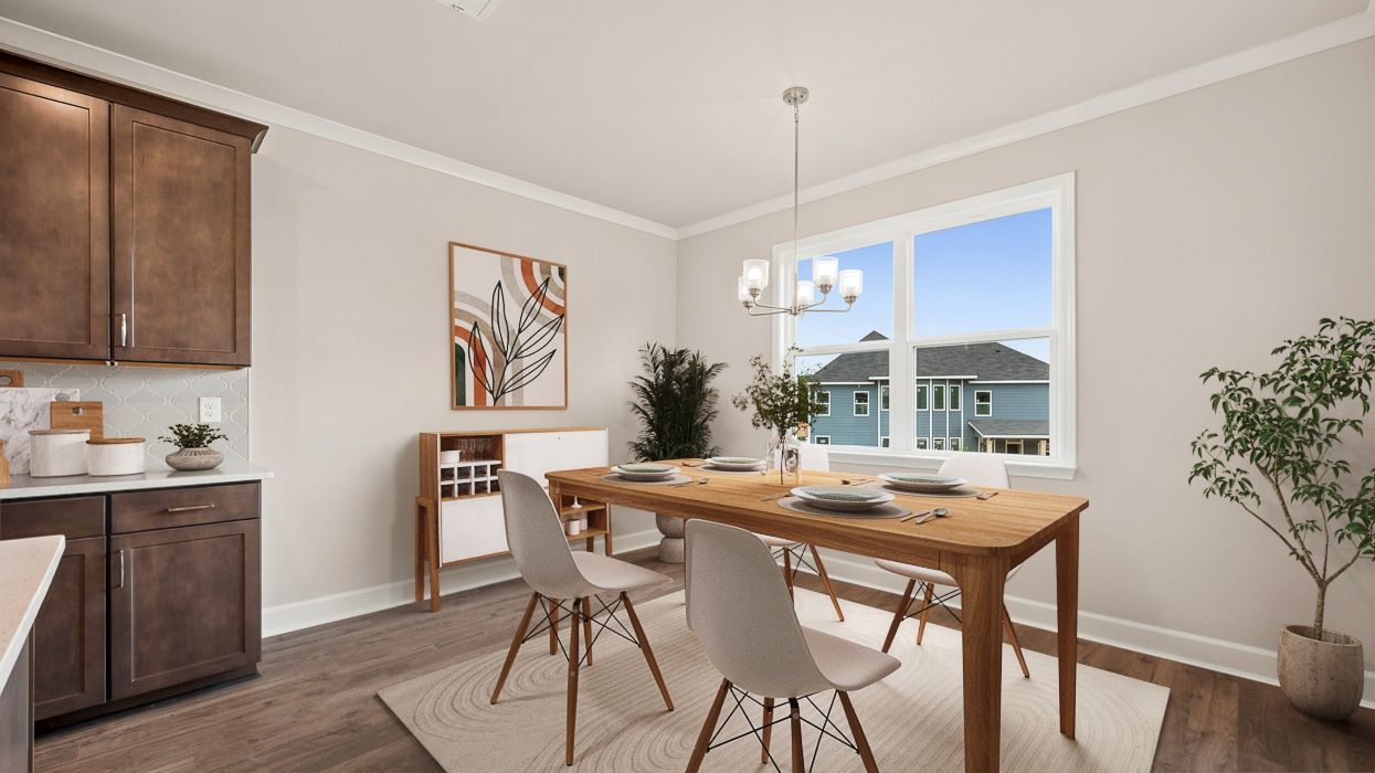 breakfast room with natural light and rear patio access