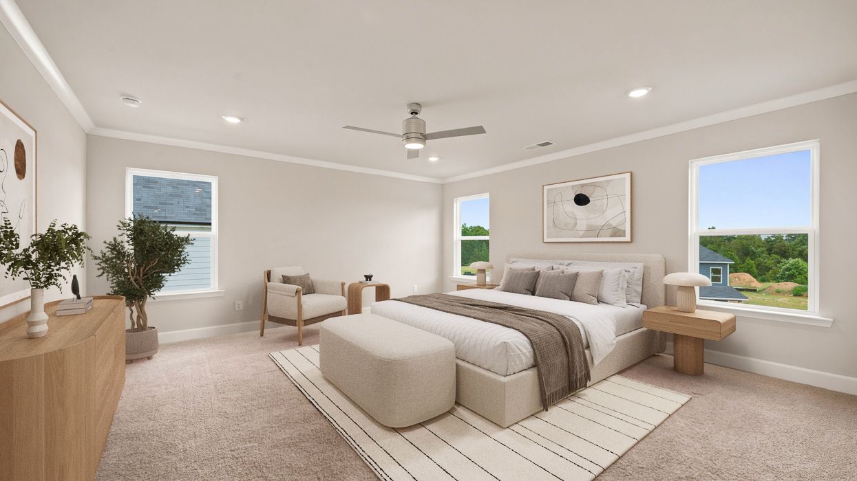 primary bedroom with abundance of natural light