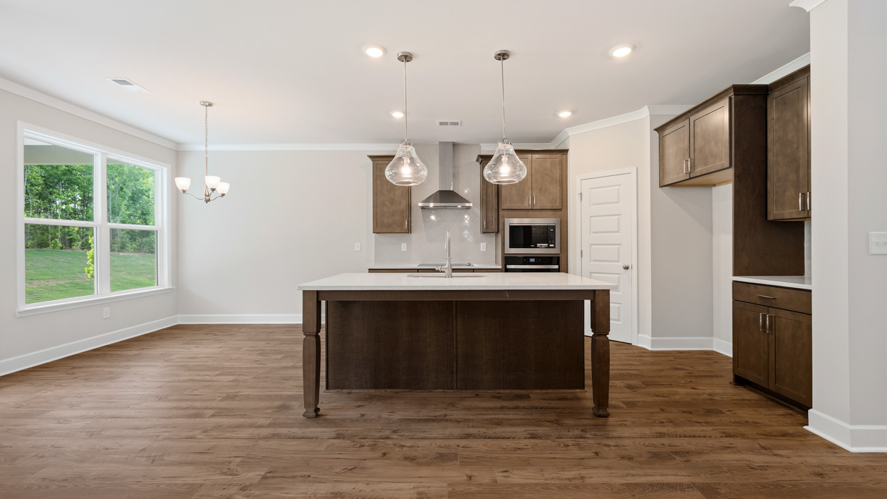 kitchen with large center island and spacious burlap cabinetry