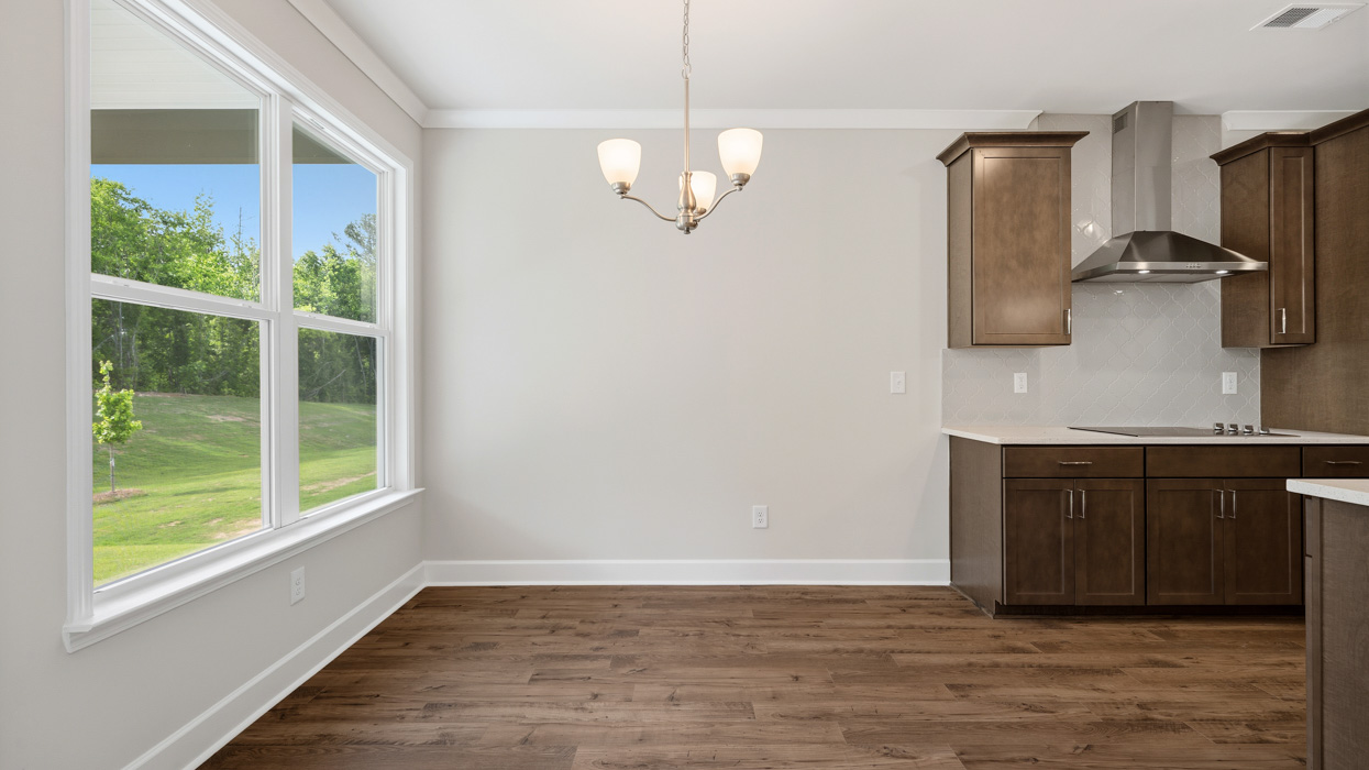 breakfast room with natural light and access to rear covered patio