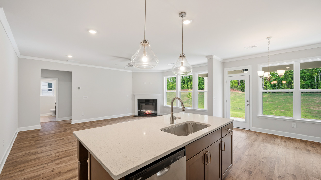 living room from kitchen with abundance of natural light