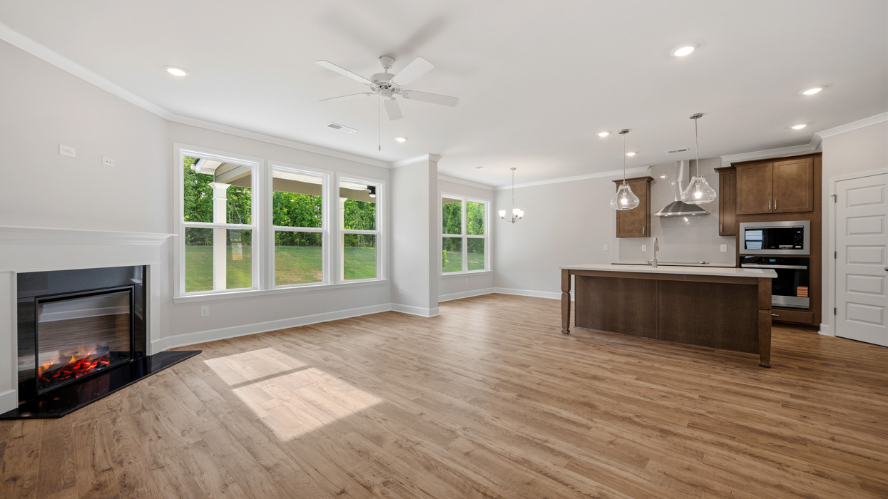 kitchen and breakfast room from living room with abundance of natural light