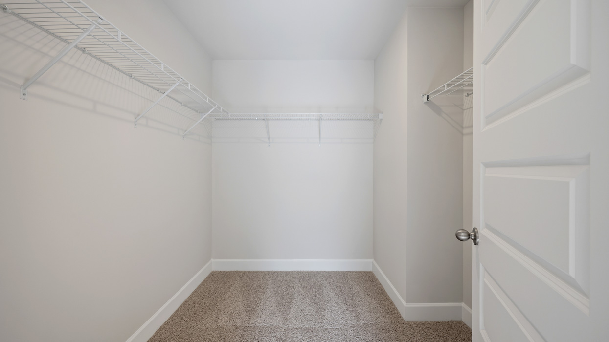 primary bedroom walk-in closet
