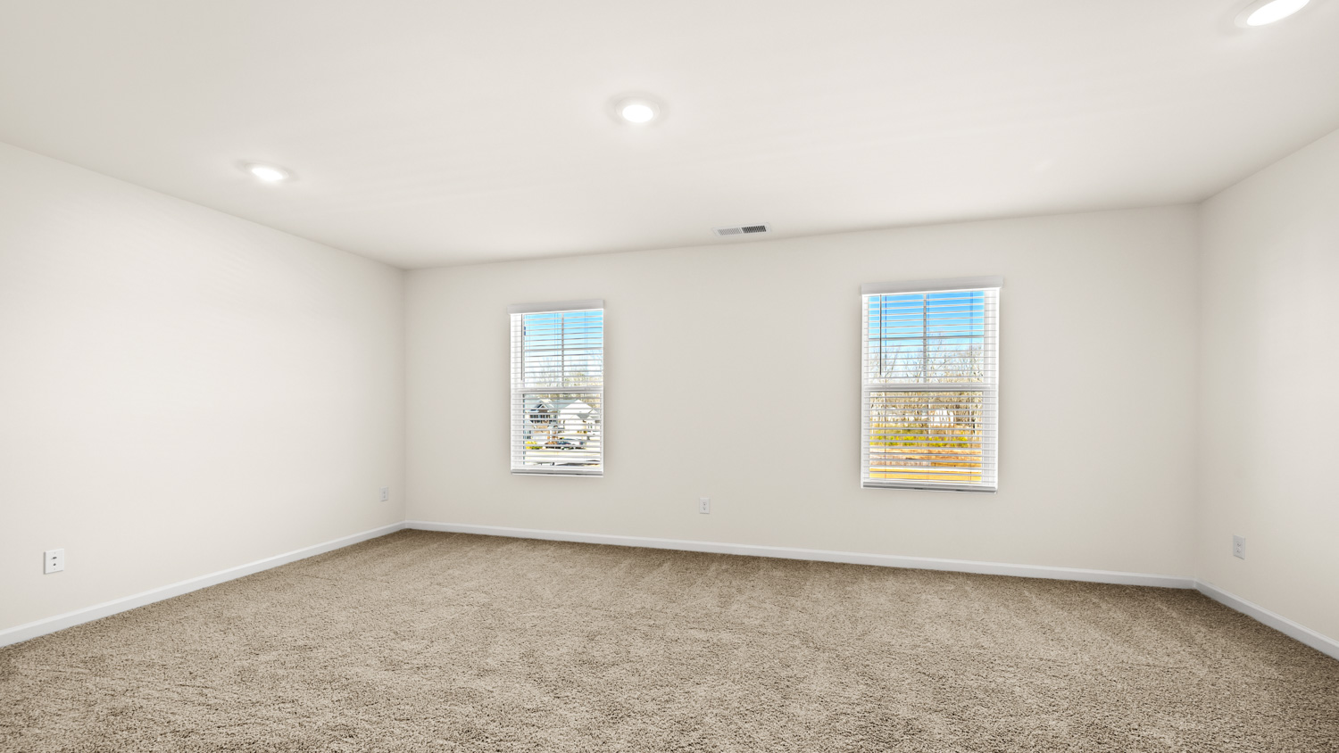 primary bedroom with natural light