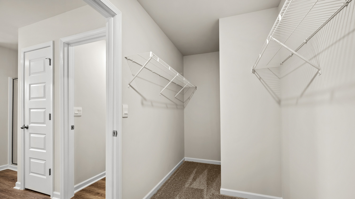 primary bedroom walk in closet