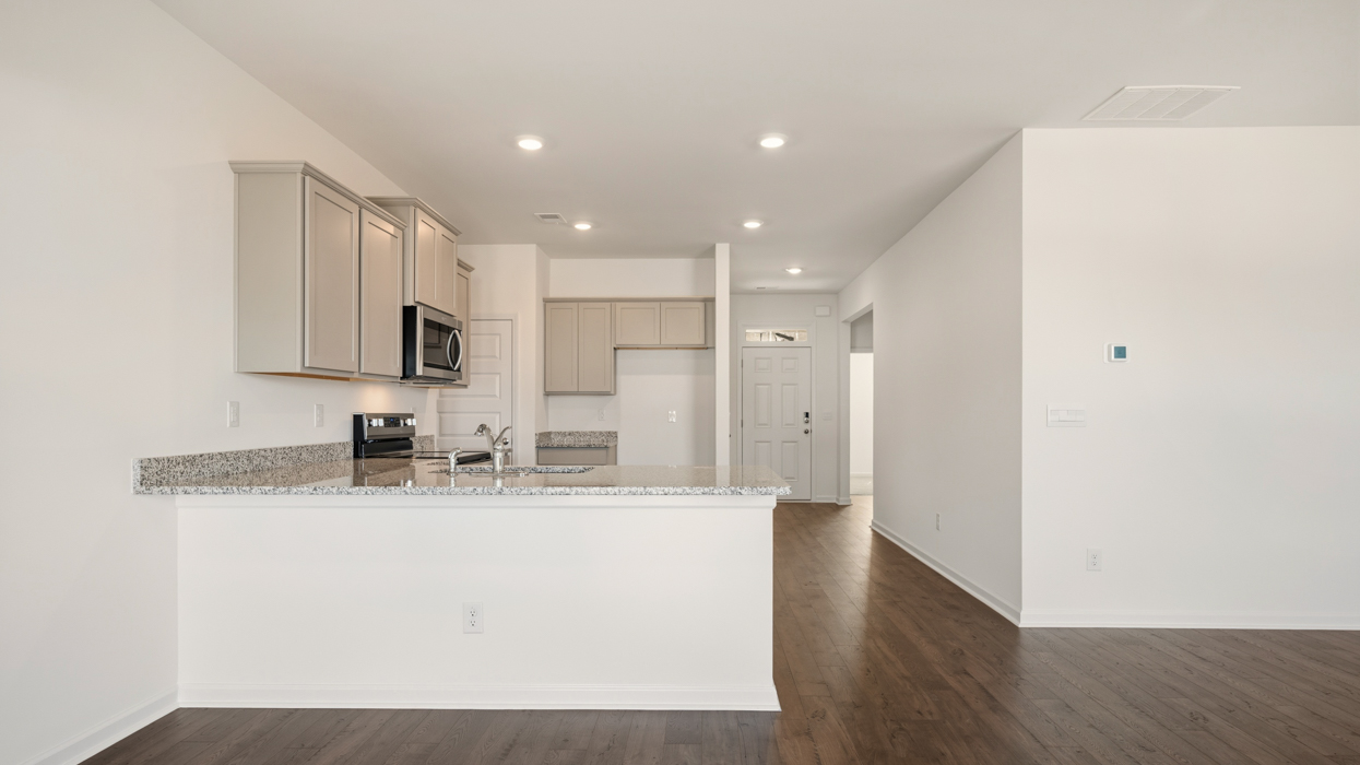 kitchen with spacious gray cabinets