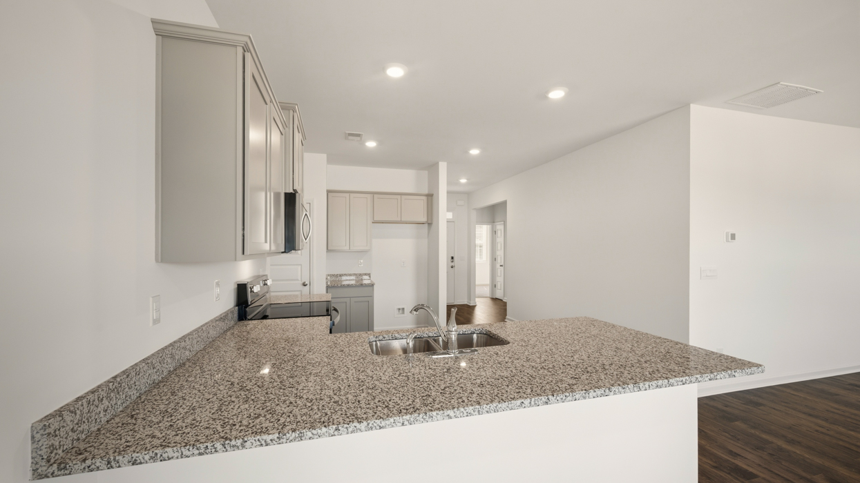 kitchen with spacious gray cabinetry