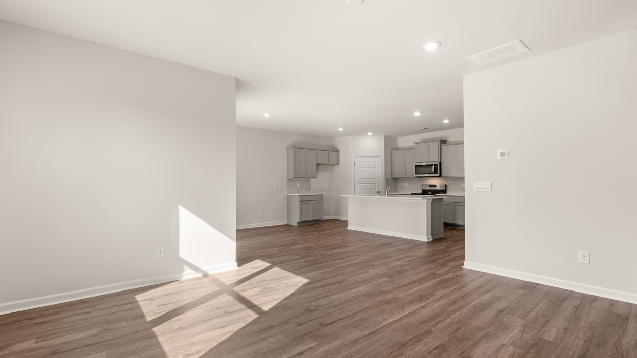 angled kitchen and dining room from living room