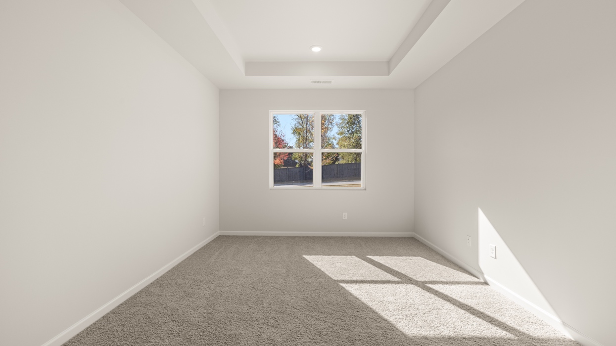 primary bedroom with natural light