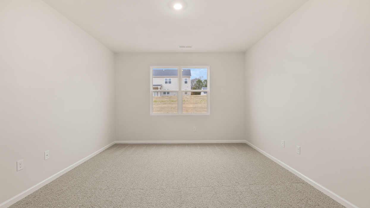 primary bedroom with natural light