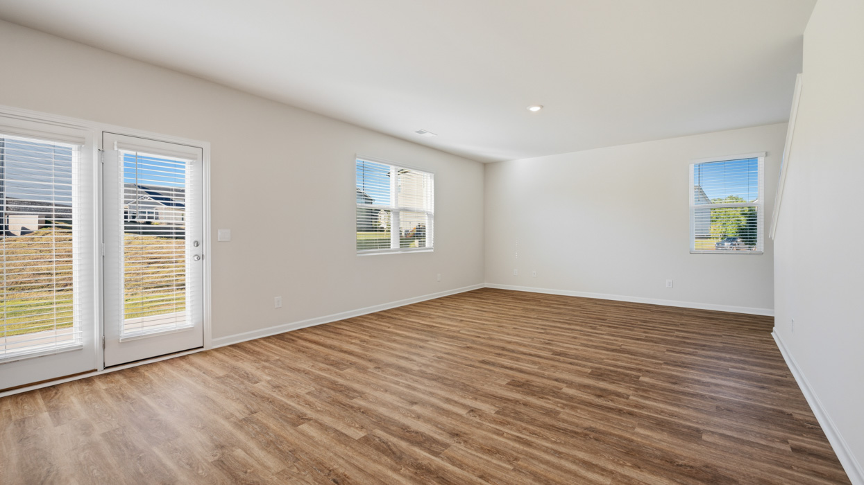 living room with natural light and access to patio