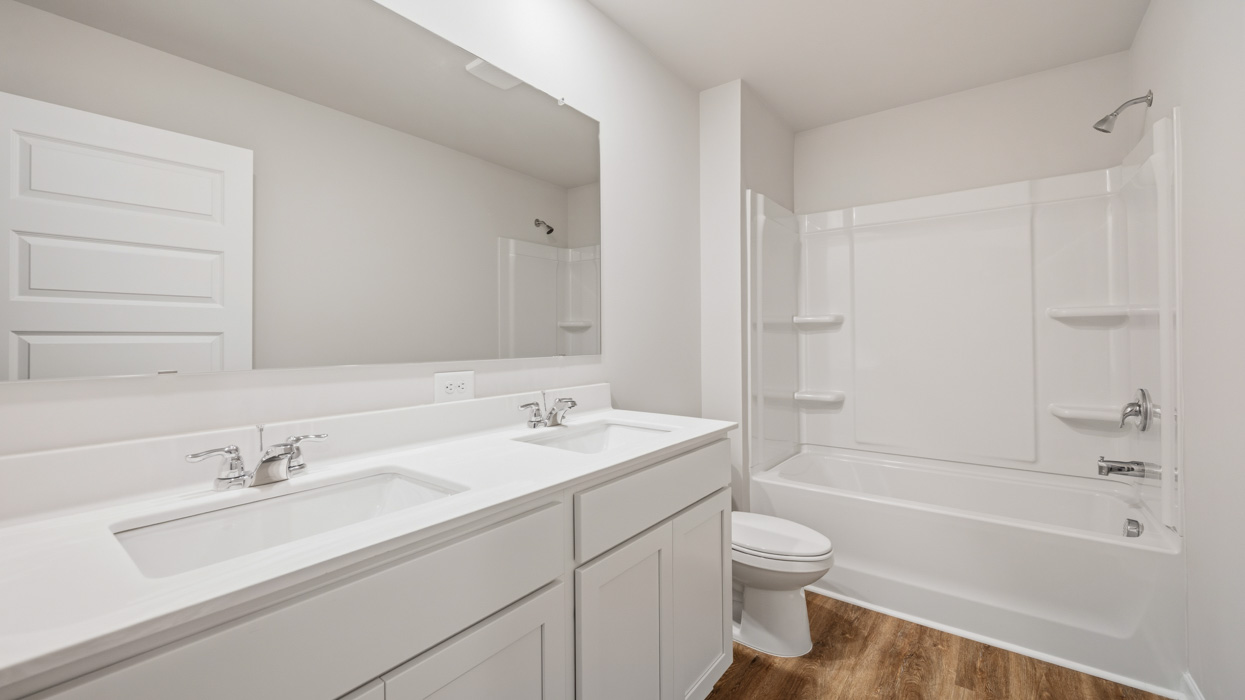 bathroom with dual sinks