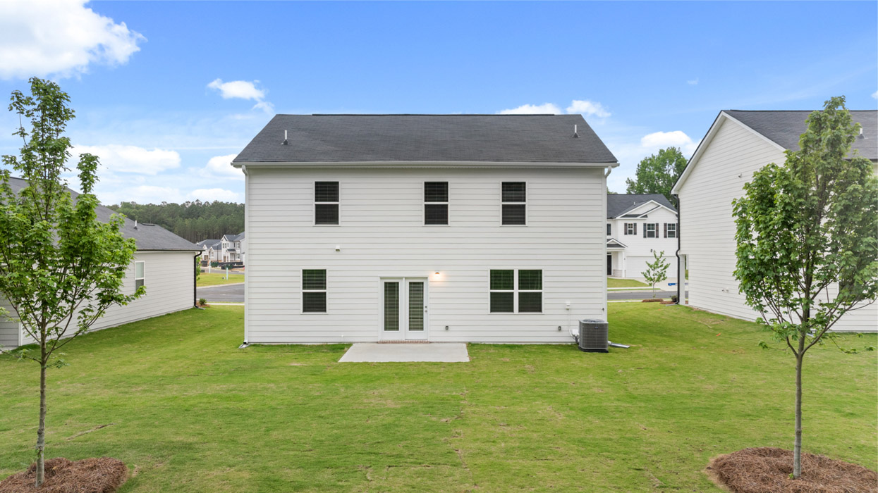 single family two story home rear