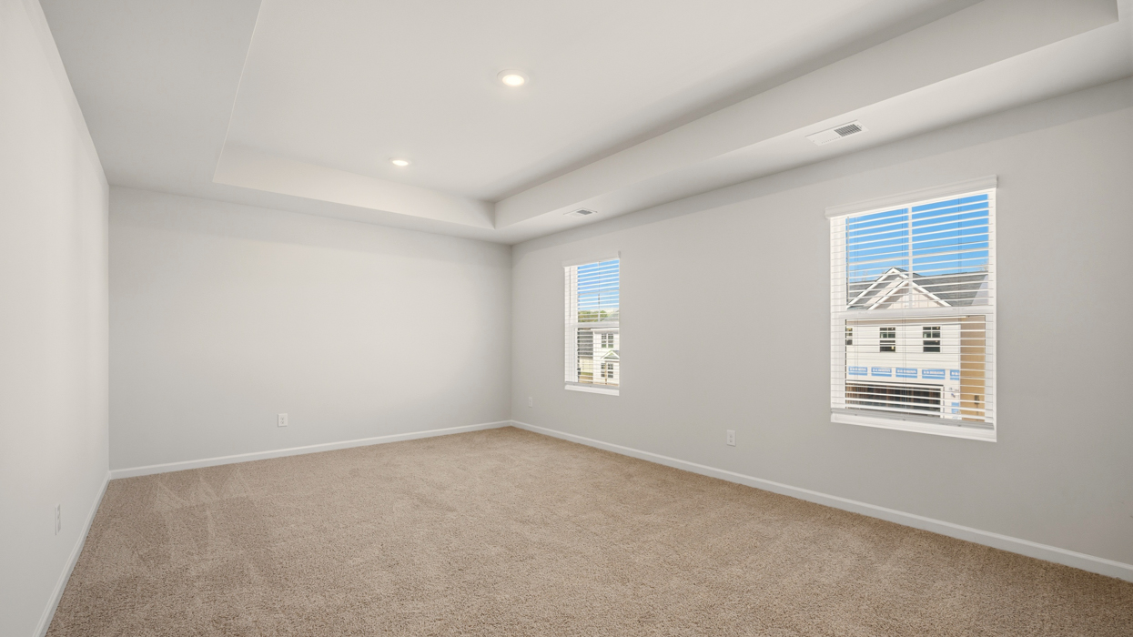 primary bedroom with natural light