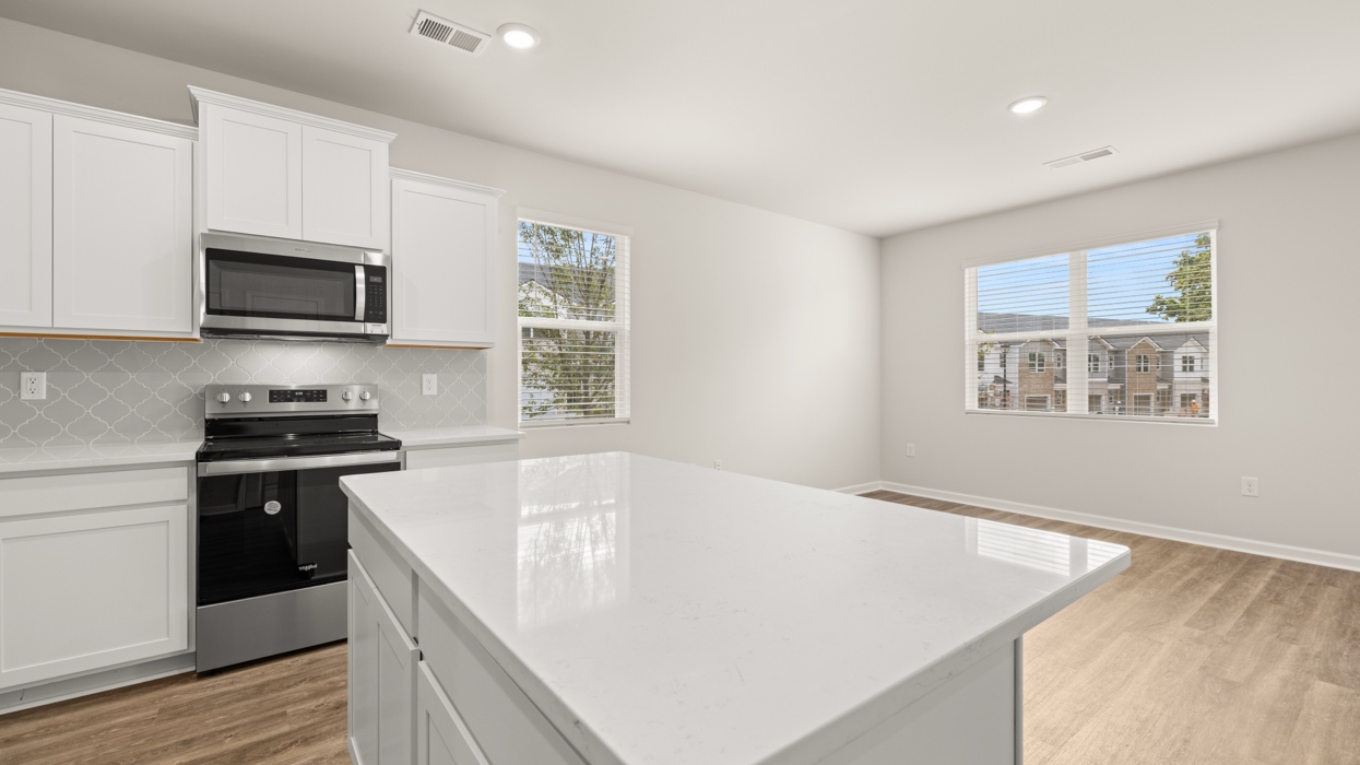 angled kitchen and living room