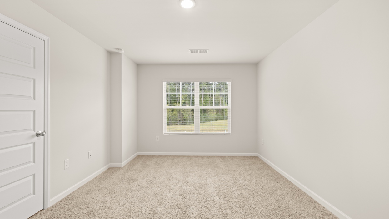 primary bedroom with natural light