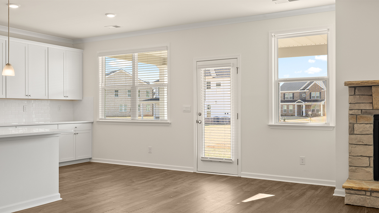 breakfast room with abundance of natural light and access to rear patio