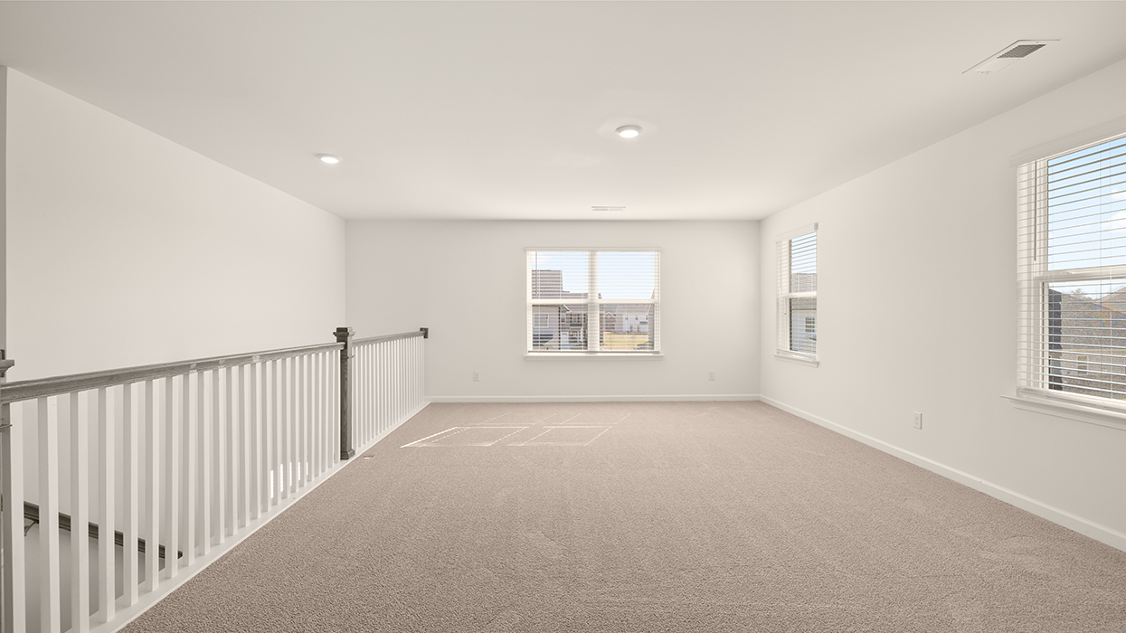 upstairs loft with abundance of natural light