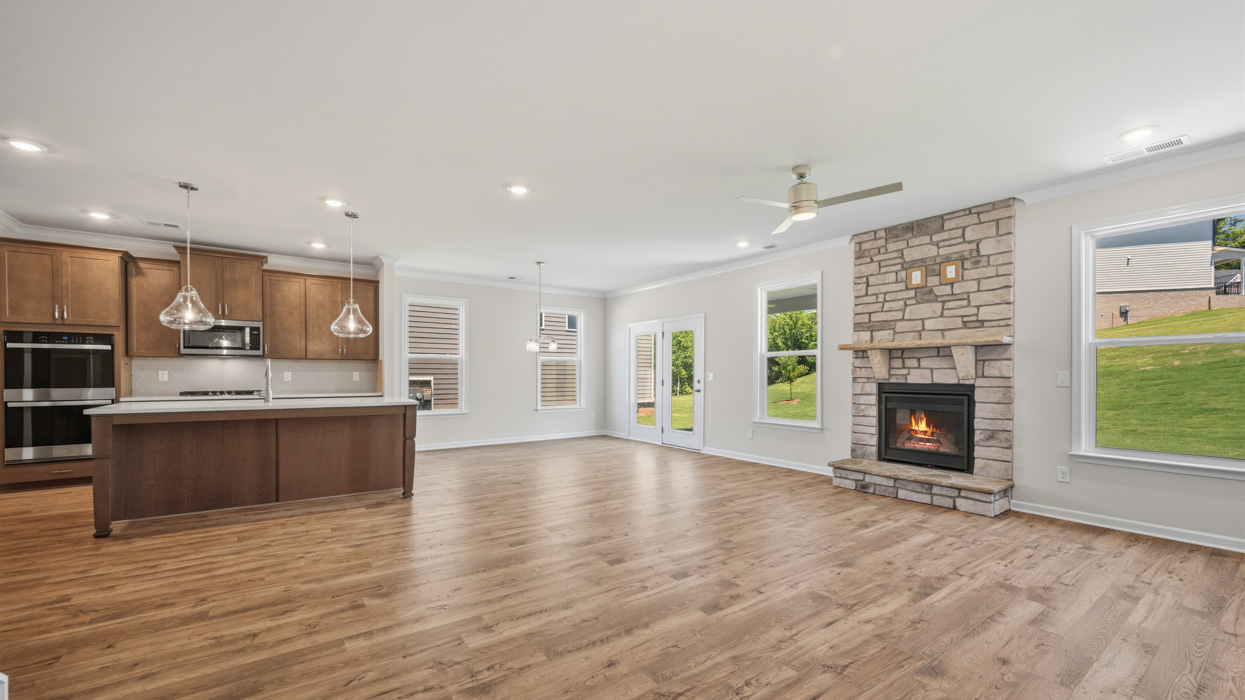 family room and fireplace to kitchen