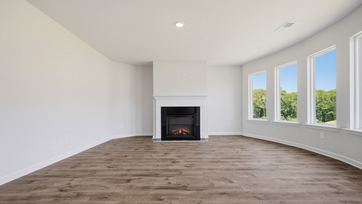bedroom 1 sitting room with firepace