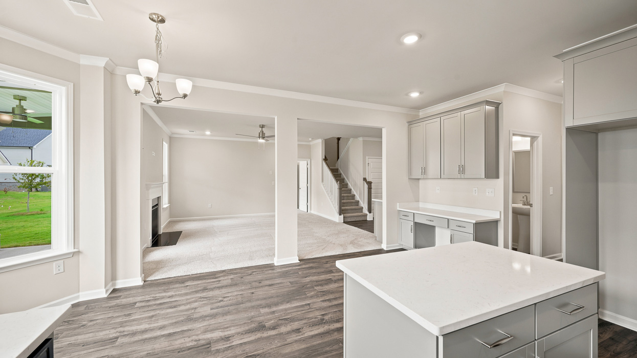 kitchen with quartz countertops and view of the breakfast nook