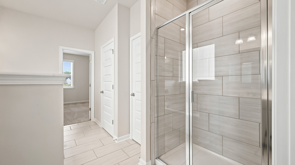 primary bathroom with walk in shower