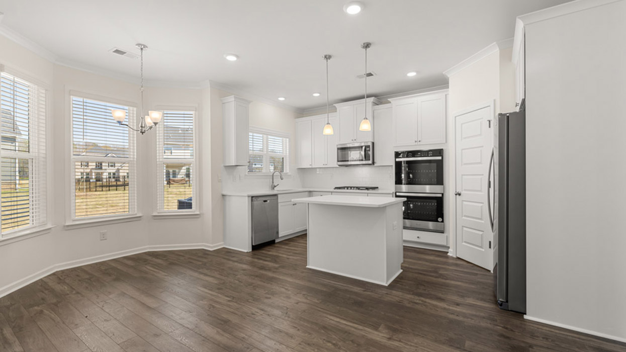 kitchen from breakfast room with natural light