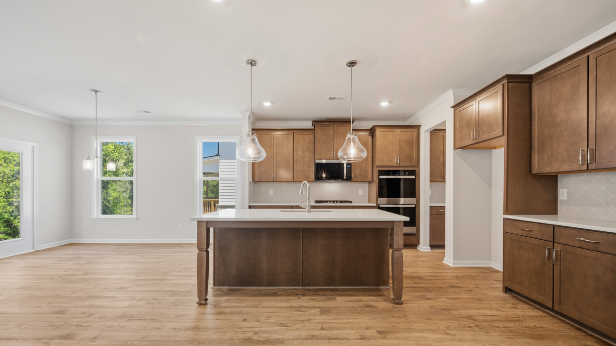 kitchen with large center island and spacious burlap cabinetry