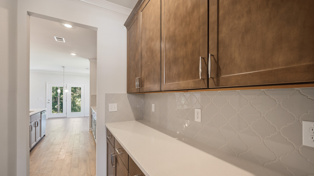 butlers pantry with burlap cabinetry