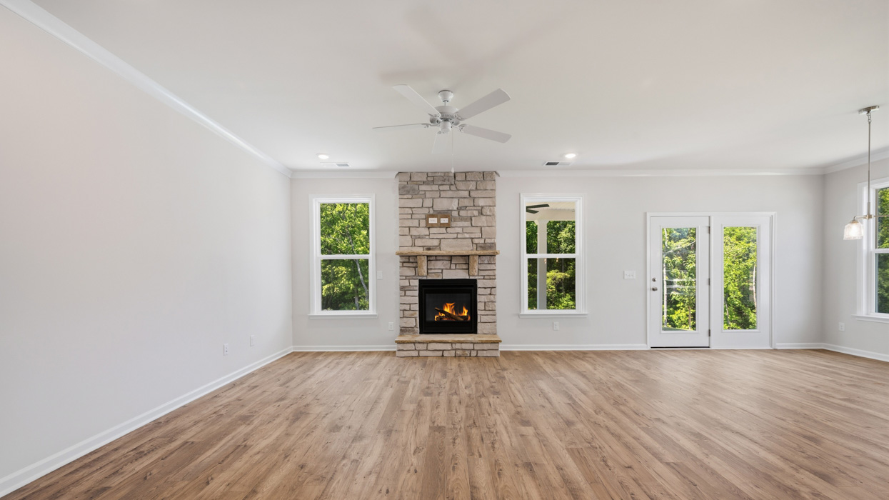 living room with access to patio and natural light