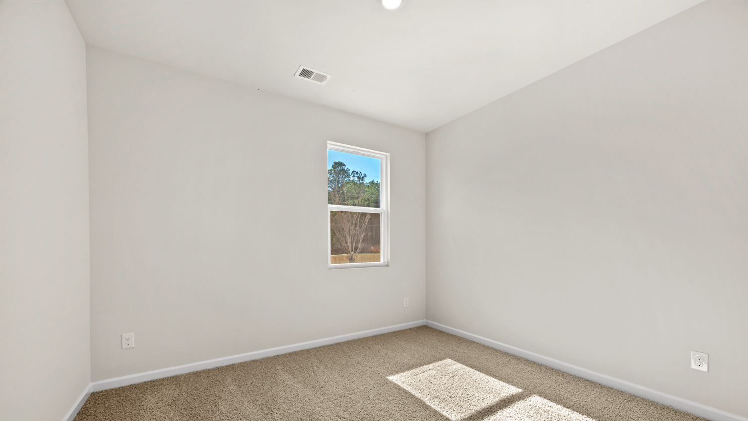 bedroom 2 with natural light