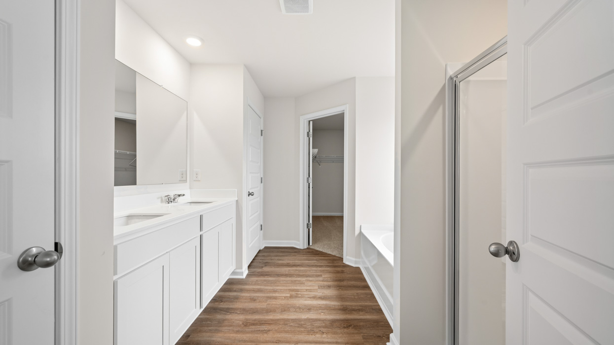 primary bathroom with dual sinks
