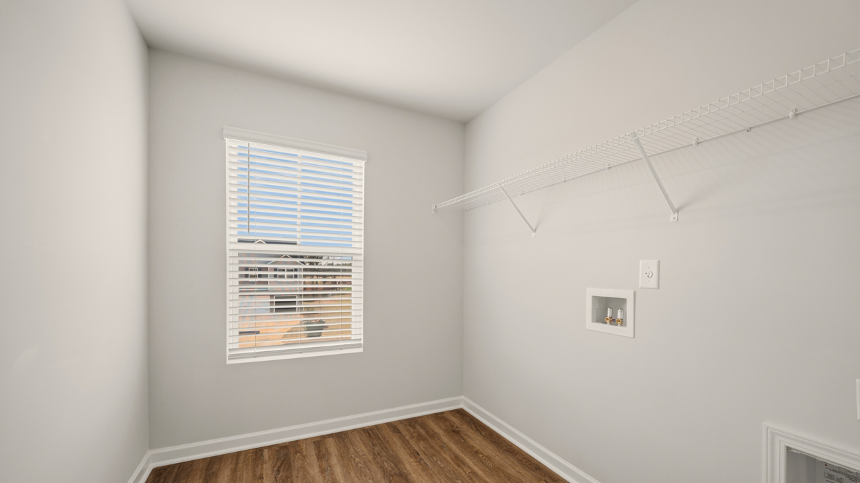 laundry room with natural light