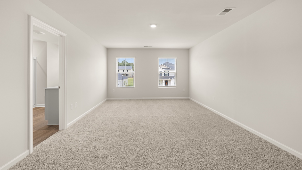 primary bedroom with natural light