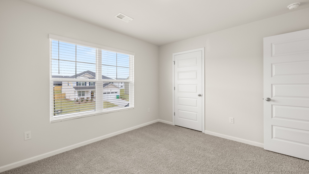 angled bedroom 3 with natural light