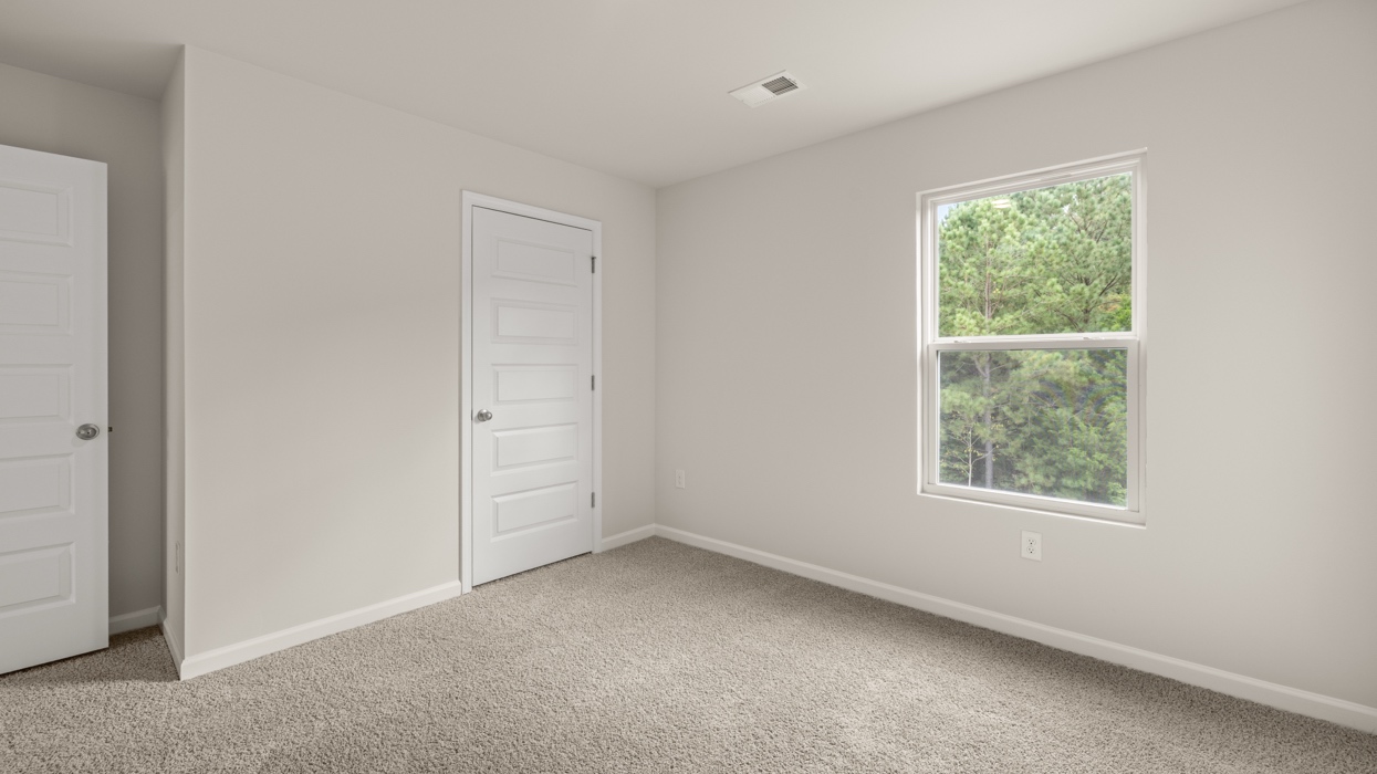 angled bedroom 5 with natural light