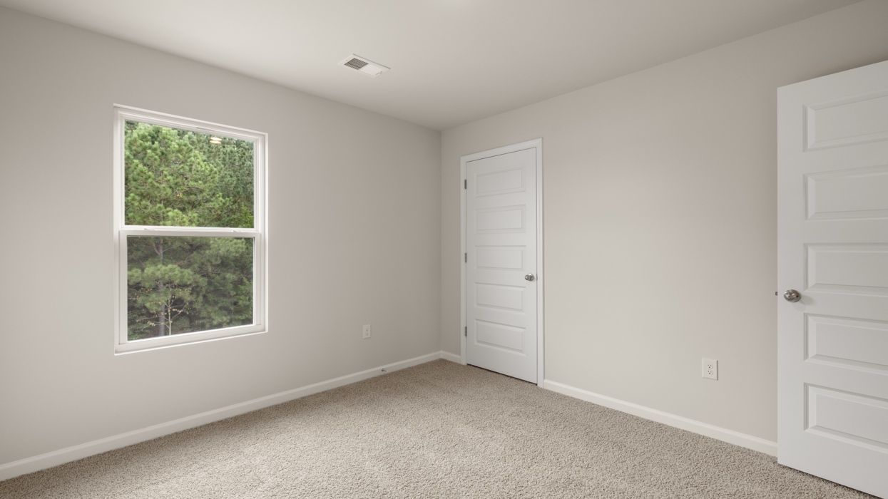angled bedroom 4 with natural light
