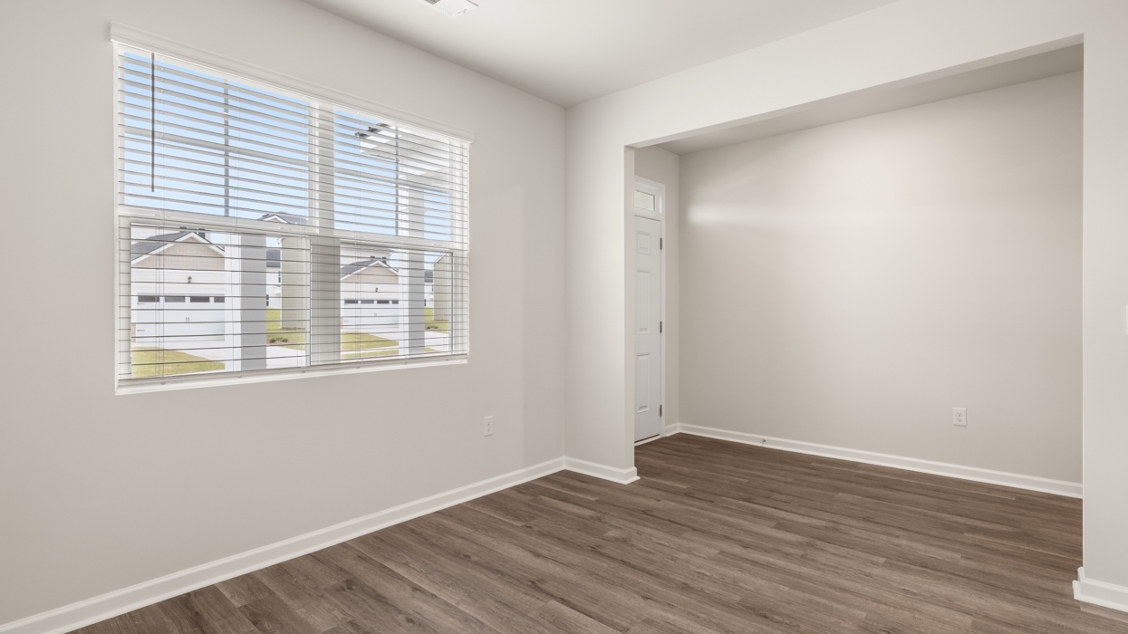 foyer and flex room with natural light