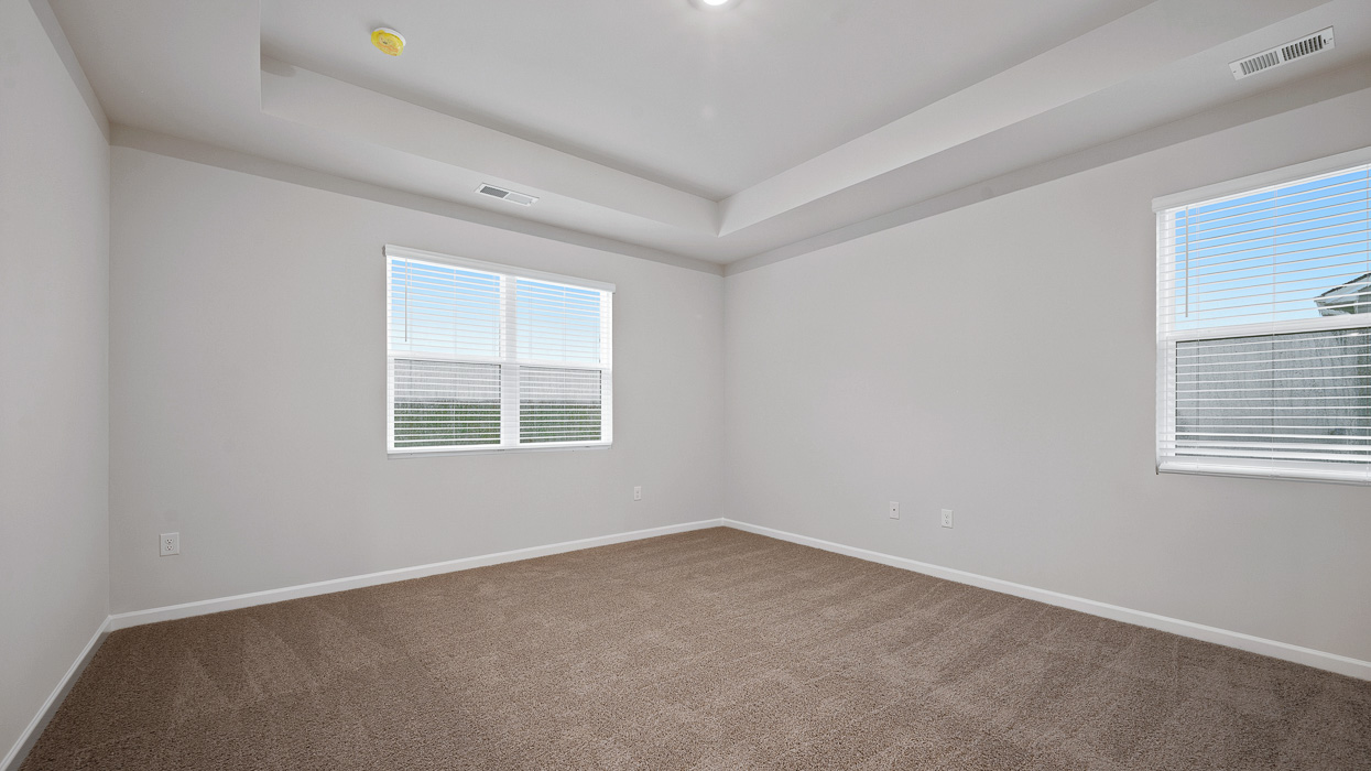 primary bedroom with abundance of natural light