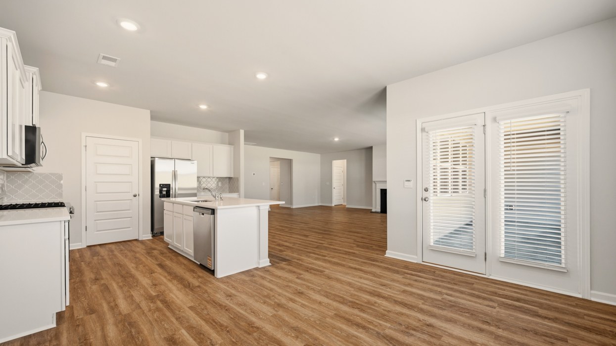angled kitchen with patio access