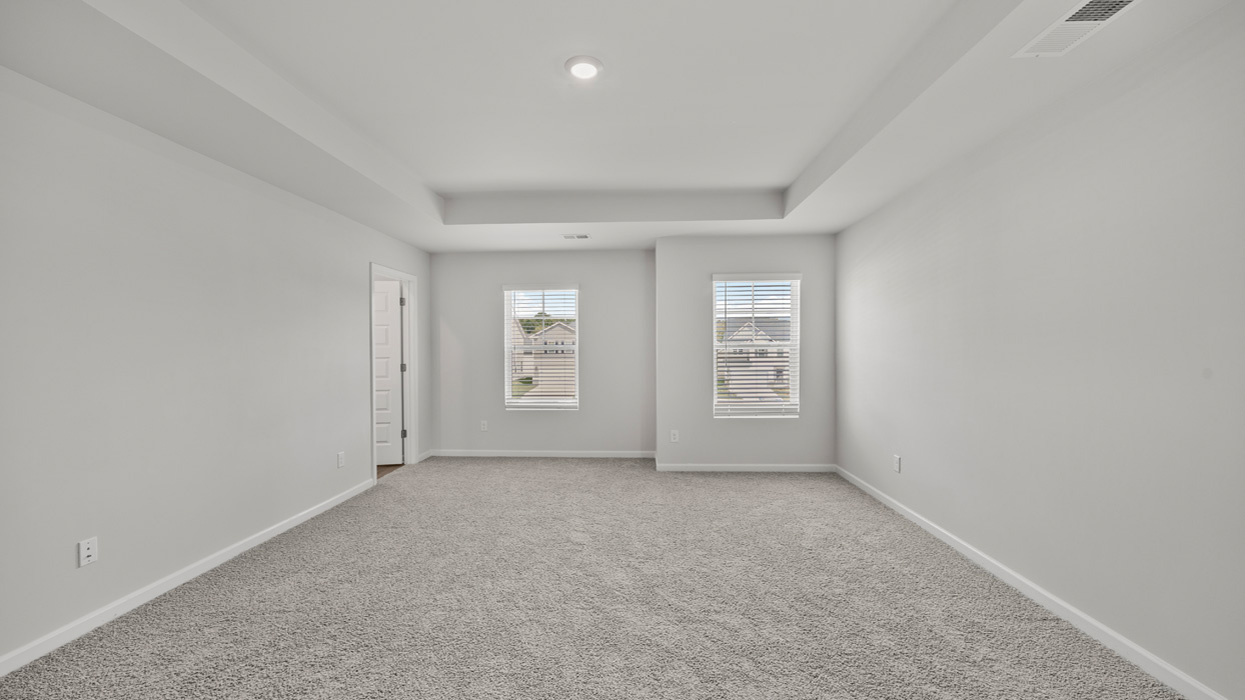 primary bedroom with abundance of natural light
